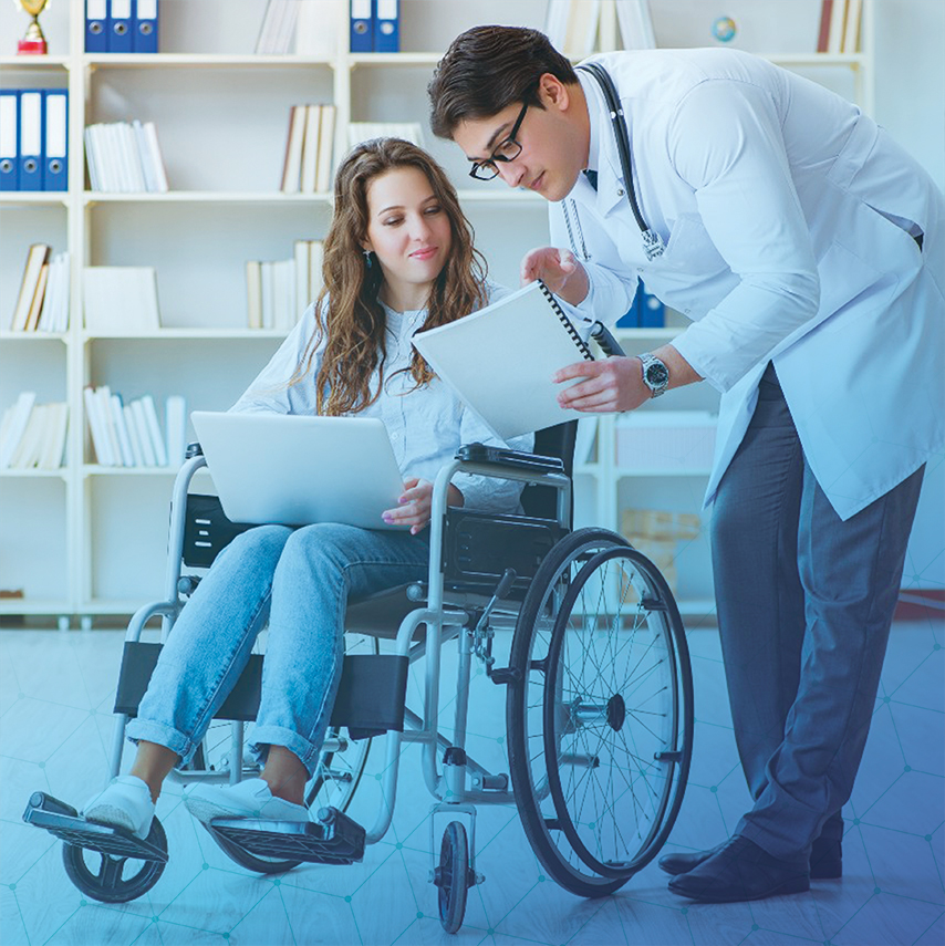 doctor with patient in wheelchair
